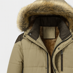 Hooded winter jacket with faux fur trim and zip front, lined for warmth and outdoor comfort