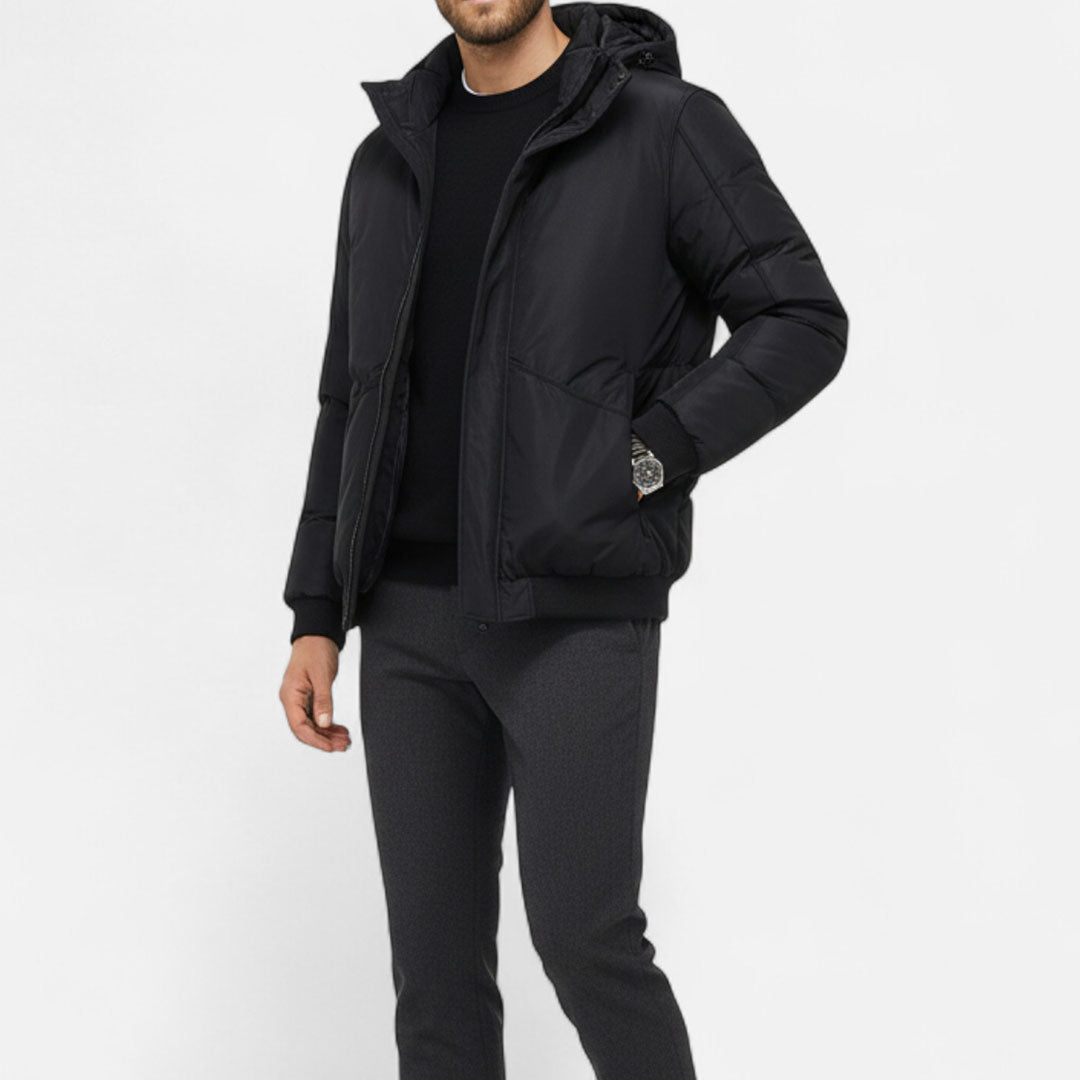 Hooded puffer jacket with zip front and insulated design, styled for modern everyday wear